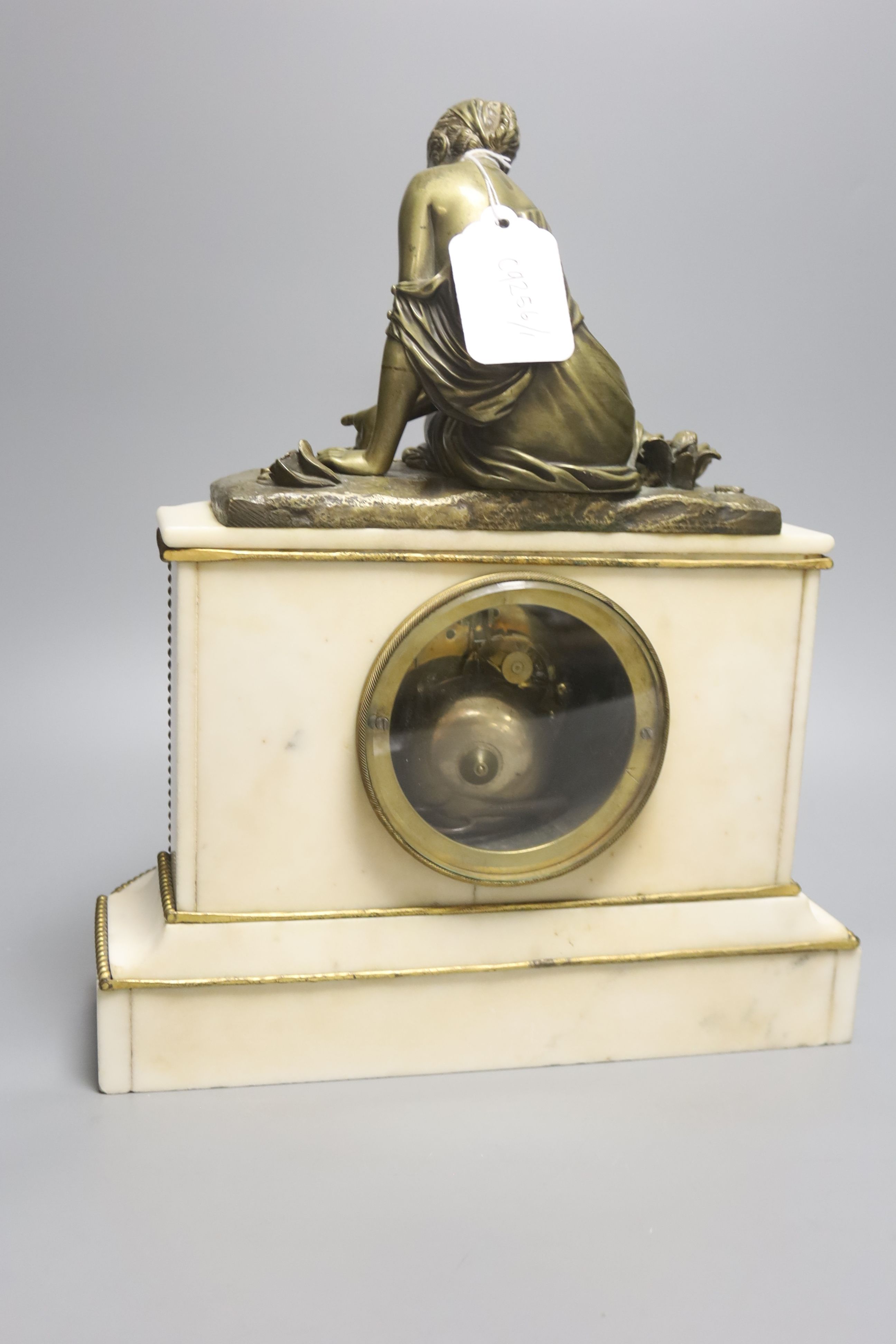 A 19th century French bronze and marble figural mantel clock, height 35cm